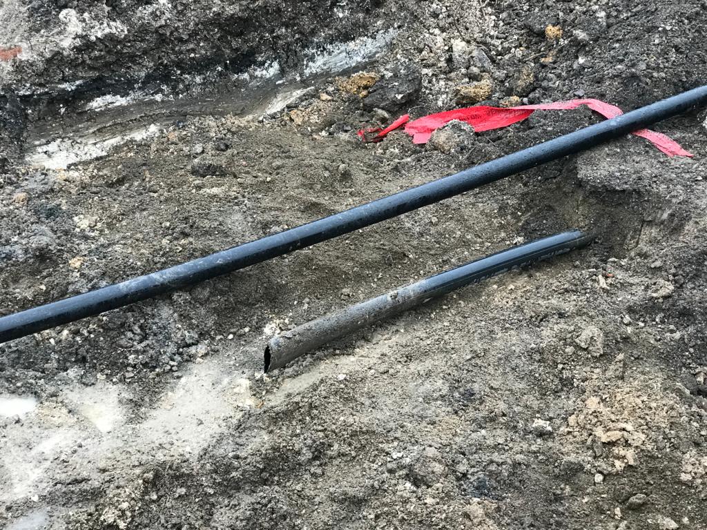 Damaged underground pipework exposed during drain repair